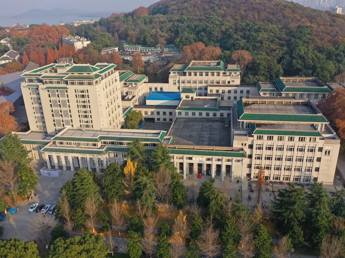 Aerial view of the Wuhan University Library among autumn trees