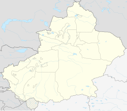 Xinjiang Normal University emblem